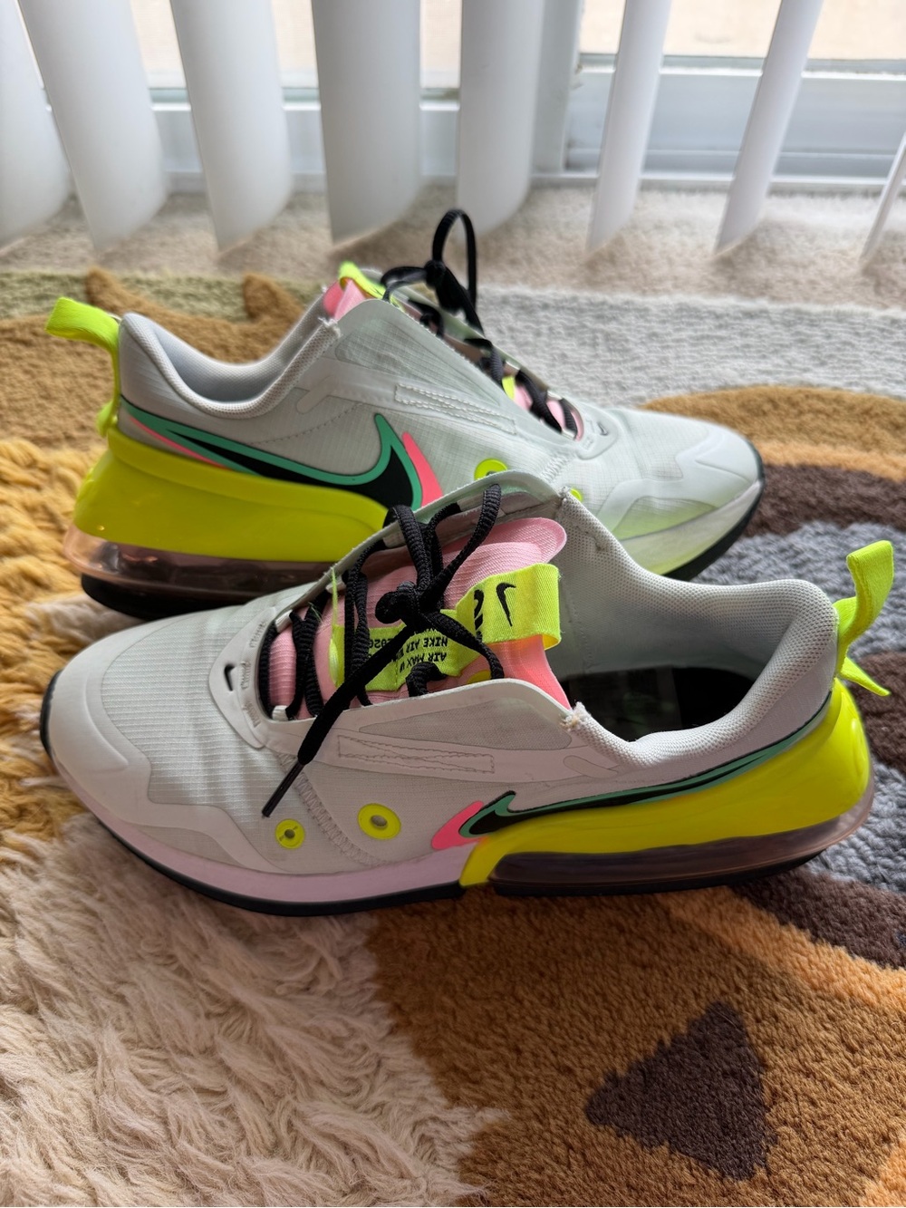 Nike women’s pale green Sneakers with Neon Yellow and Pink Accents